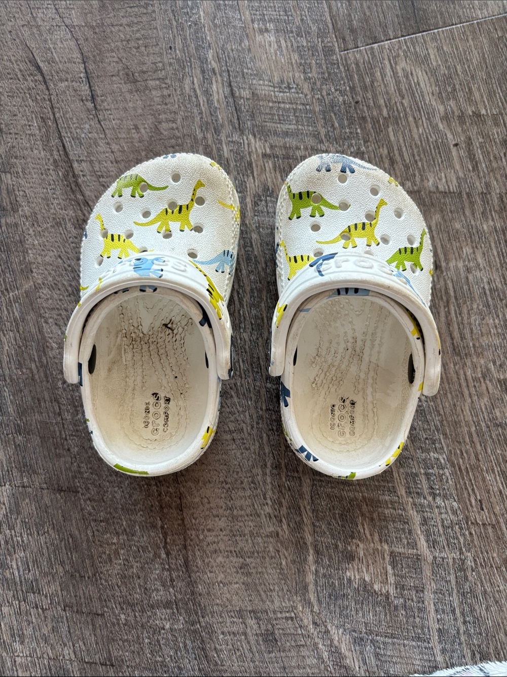 CROCS Kids Buzz Lightyear and White Clogs with Green & Blue Dinosaur